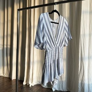 Striped blue and white romper with smocked waist